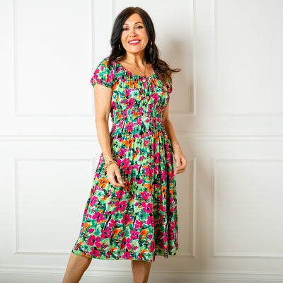 The floral green Printed Button Midi Dress with shirred detailing around the waist